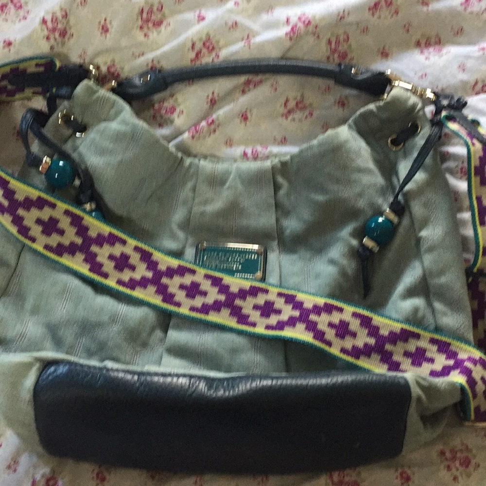 - Marc Jacobs bag with guitar camera strap